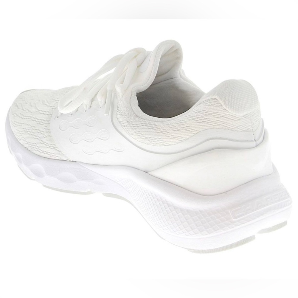 All white Under Armour sneakers, women’s size 7. Very good condition.